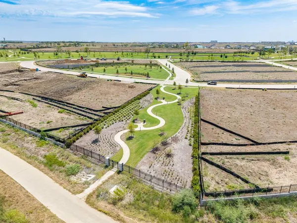 a view of a swimming pool with outdoor seating