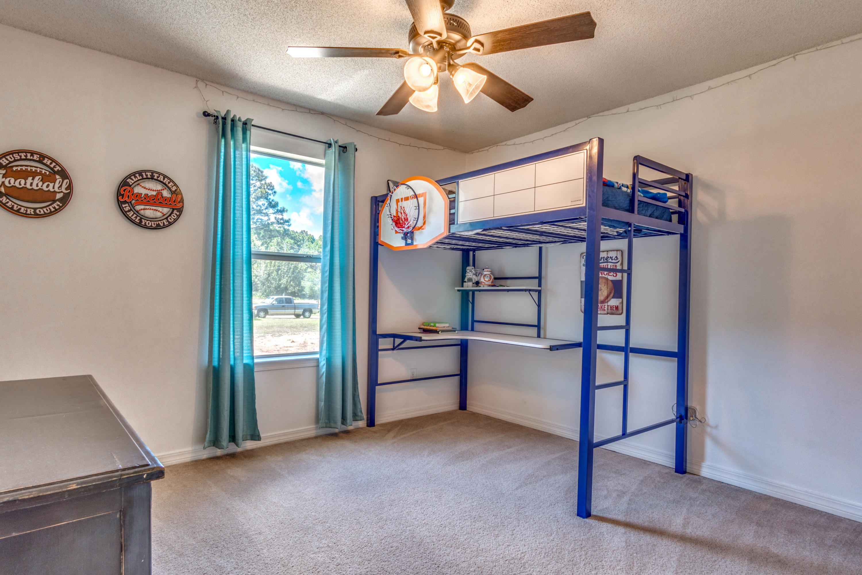 7105 Snug Waters Road Navarre, FL 32566 - Photo 24 of 42 a view of an empty room and window
