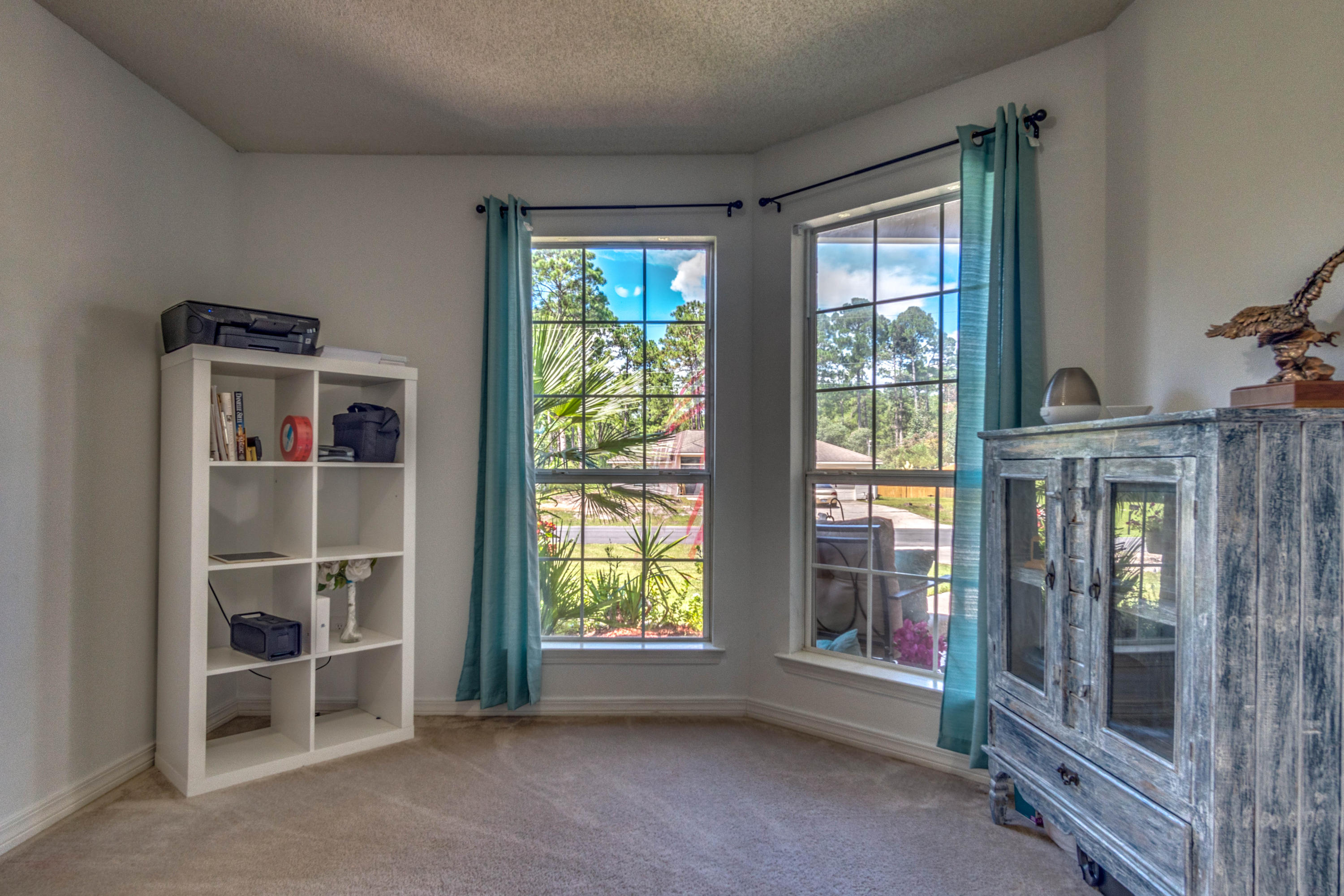 7105 Snug Waters Road Navarre, FL 32566 - Photo 29 of 42 a view of an empty room with a window