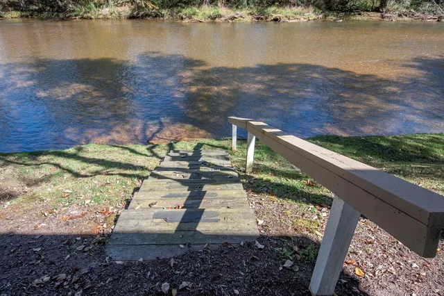 a view of a lake with a mountain in the background