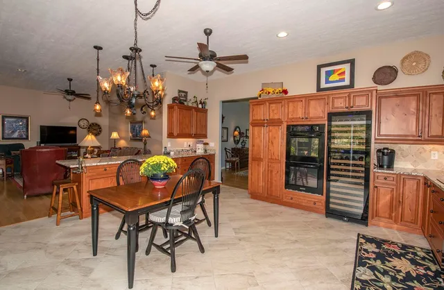 a view of a dining room kitchen and furniture