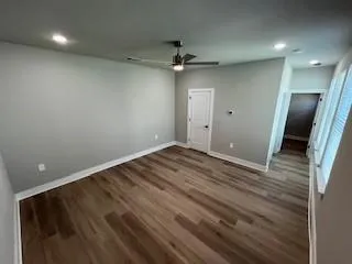 an empty room with a mirror