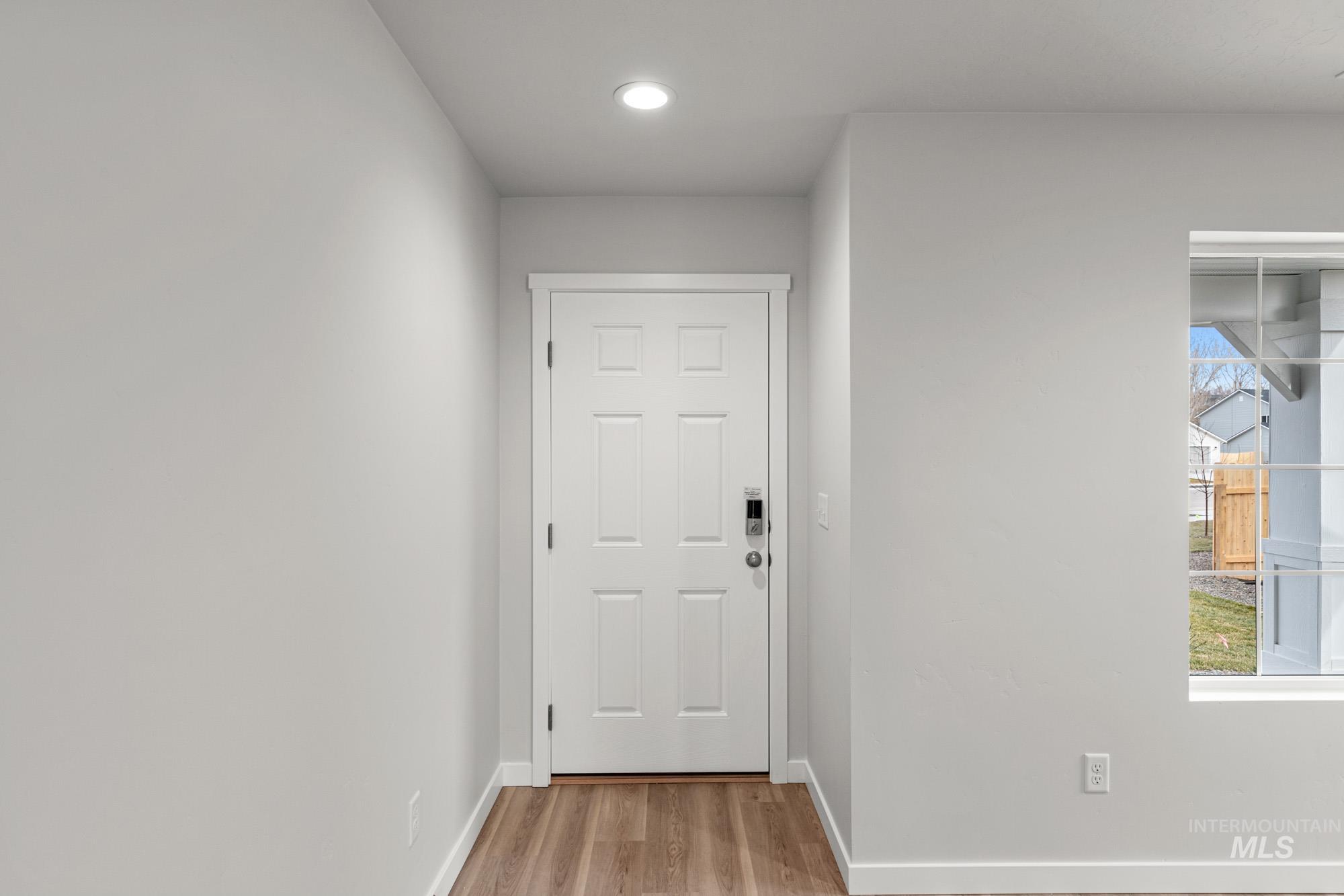 1533 Long Pond Street Middleton, ID 83644 - Photo 2 of 21 Entryway featuring wood finished floors and recessed lighting