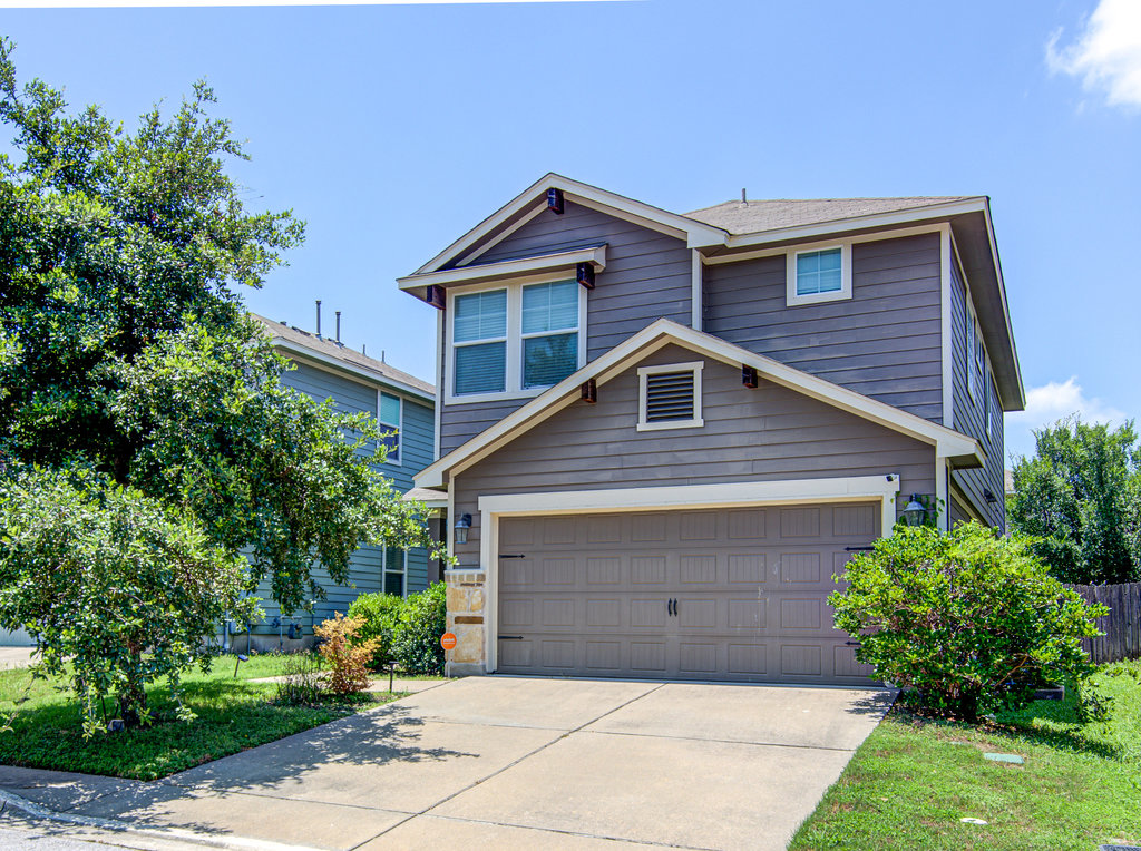 8528 Inca Dove Drive, Unit 354 Austin, TX 78729 - Photo 1 of 1 Traditional home with concrete driveway and a garage