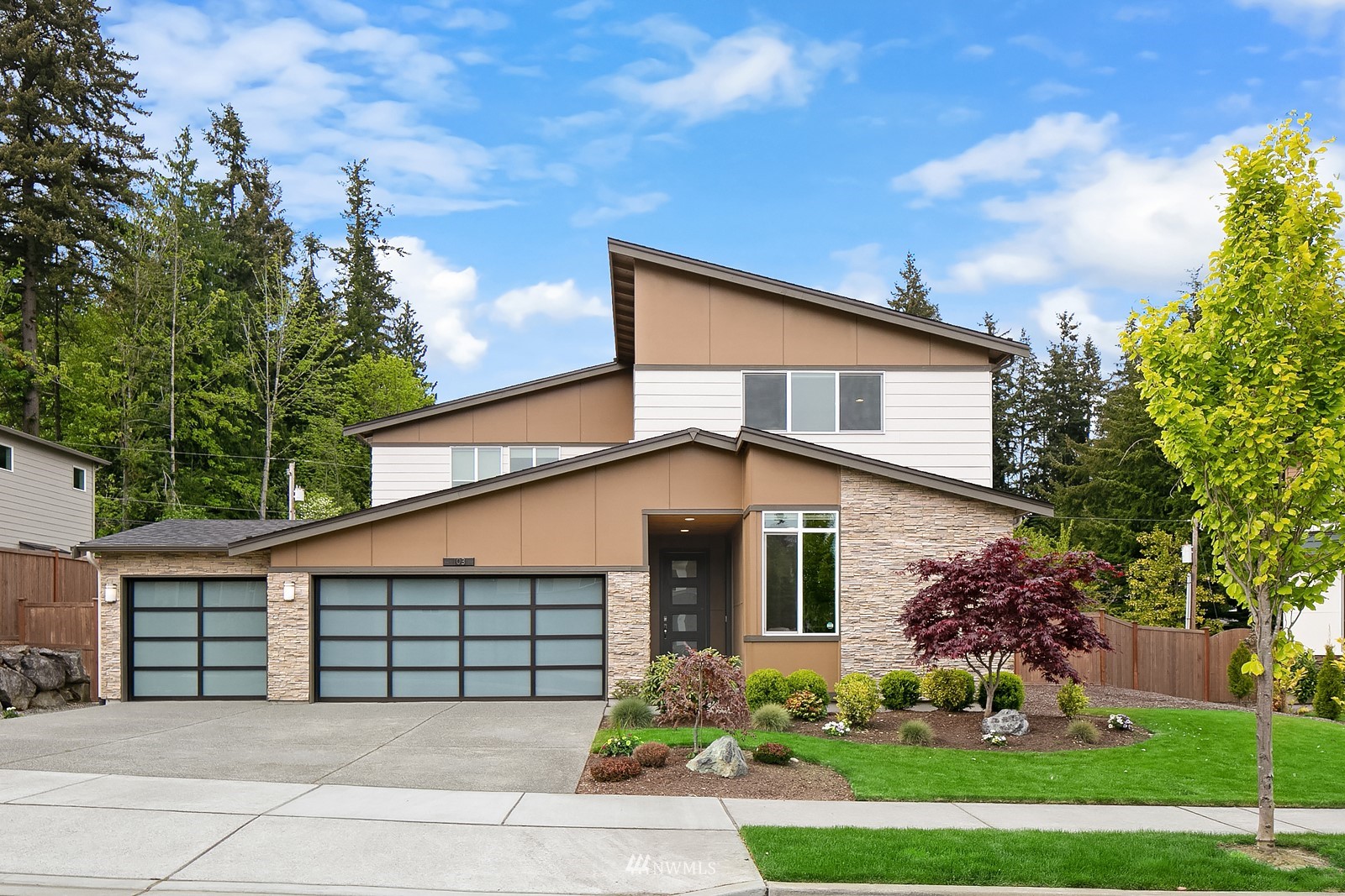 103 236th Place Southeast Bothell, WA 98021 - Photo 1 of 37 front view of a house with a garden