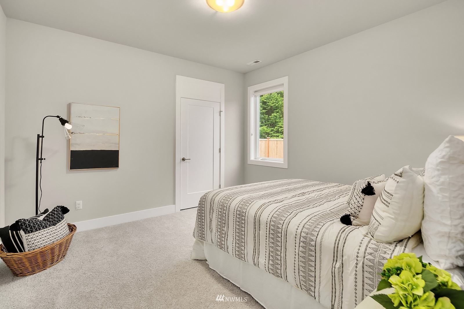 103 236th Place Southeast Bothell, WA 98021 - Photo 18 of 37 a bedroom with a bed and a window