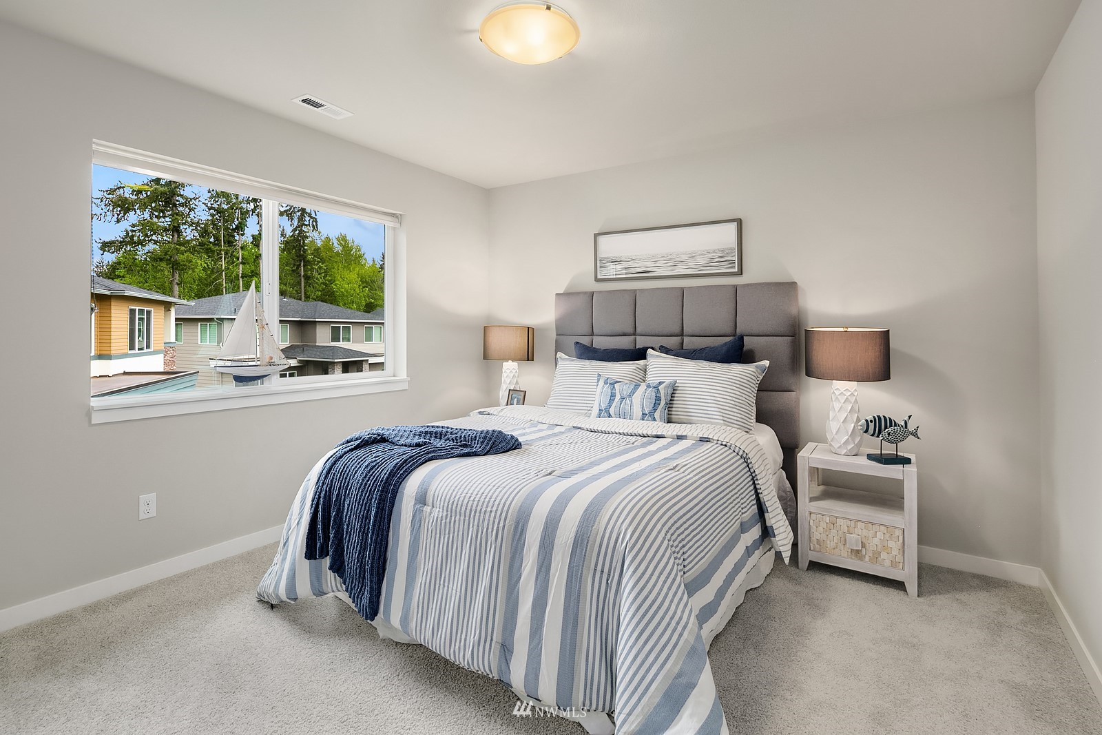 103 236th Place Southeast Bothell, WA 98021 - Photo 24 of 37 a bed room with a bed and a large window