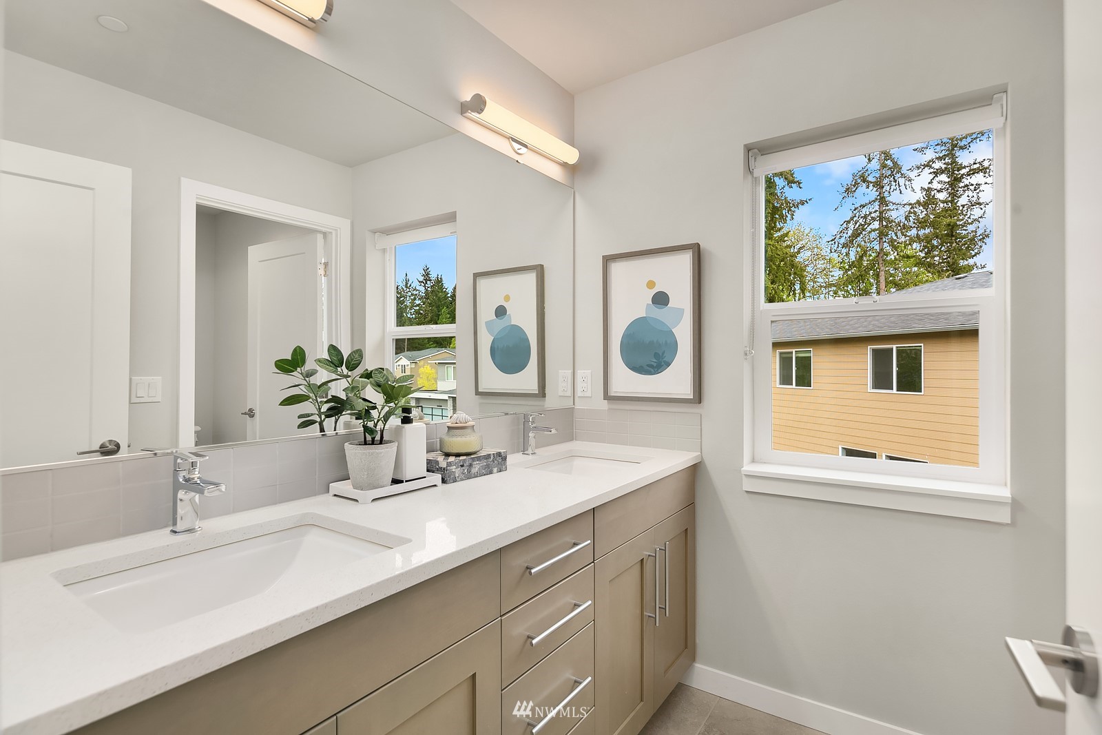 103 236th Place Southeast Bothell, WA 98021 - Photo 25 of 37 a bathroom with a sink and a mirror