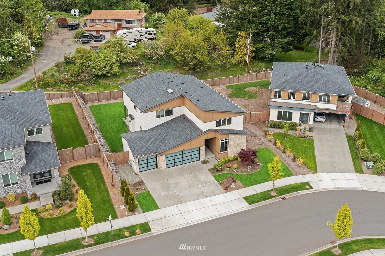 103 236th Place Southeast Bothell, WA 98021 - Photo 33 of 37 an aerial view of multiple houses with a yard