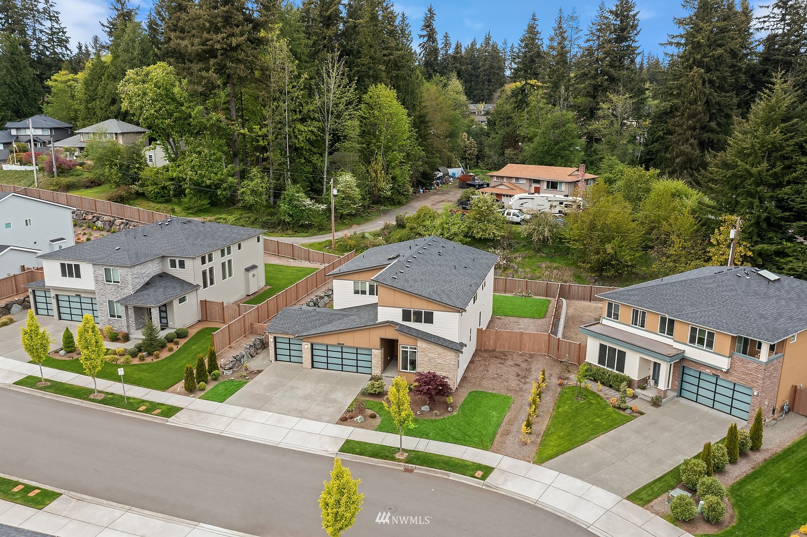 103 236th Place Southeast Bothell, WA 98021 - Photo 34 of 37 an aerial view of multiple houses with a yard