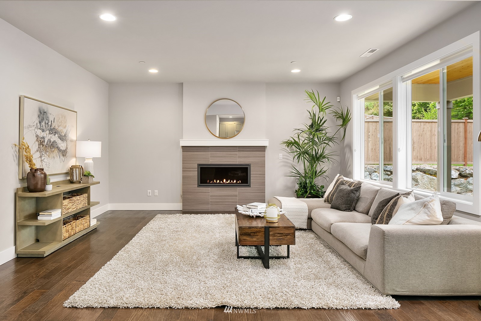 103 236th Place Southeast Bothell, WA 98021 - Photo 5 of 37 a living room with furniture and a fireplace