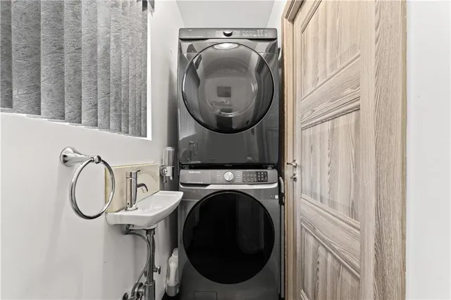 a utility room with dryer and washer