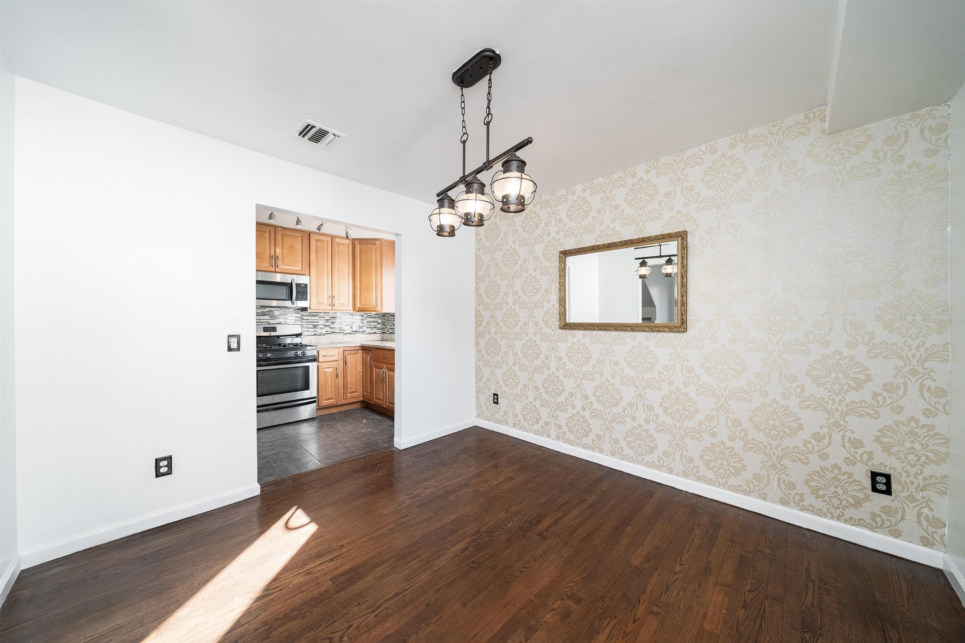 156 Main Street East Rutherford, NJ 07073 - Photo 19 of 19 a view of a kitchen and a sink wooden floor