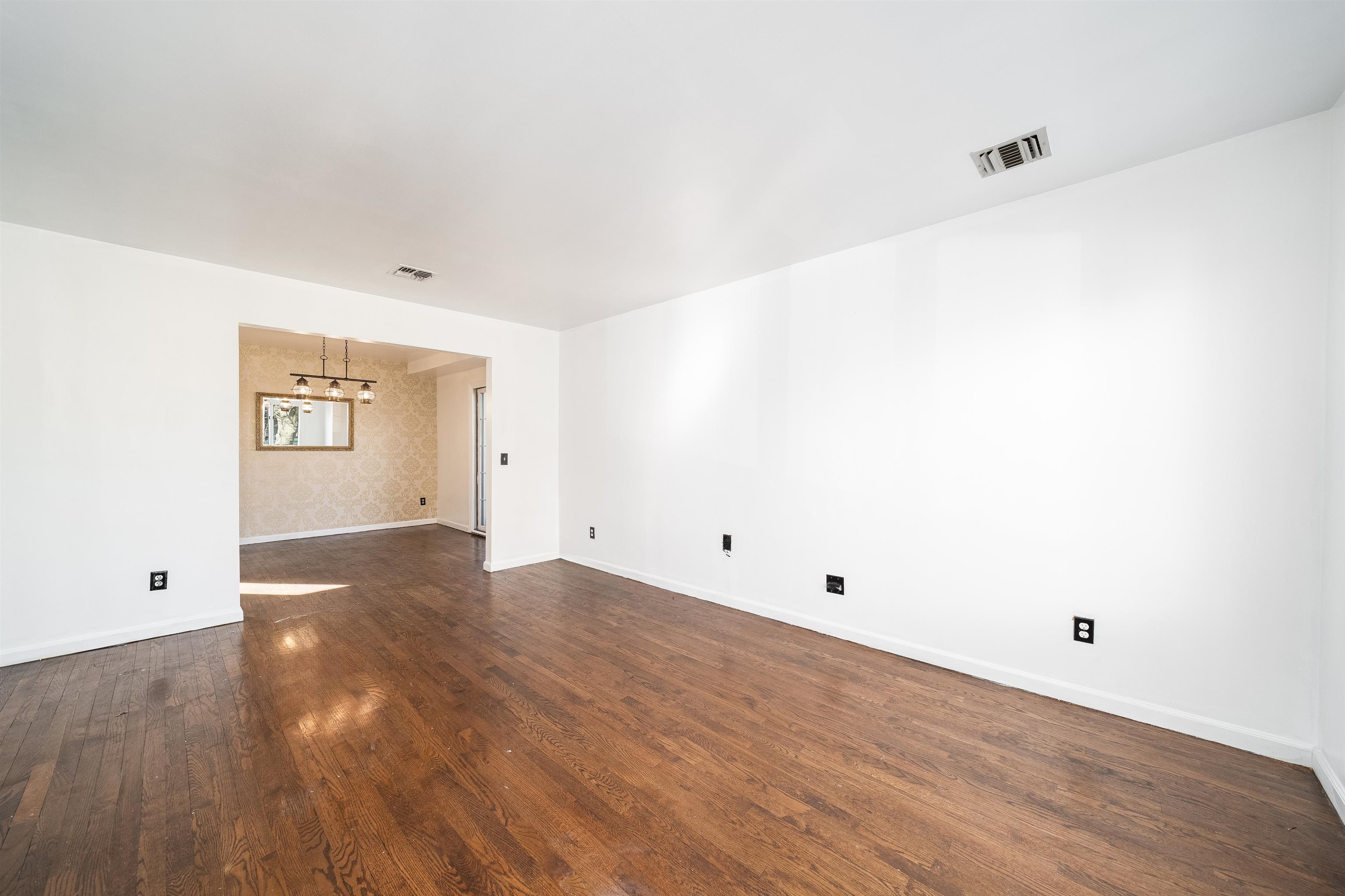 156 Main Street East Rutherford, NJ 07073 - Photo 5 of 19 a view of a room with wooden floor