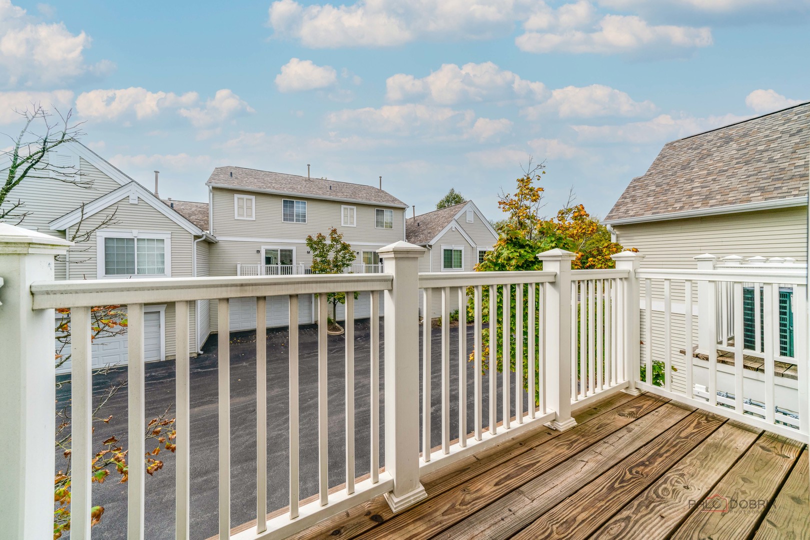 1719 Sienna Court Wheeling, IL 60090 - Photo 12 of 34 a view of a house with wooden fence
