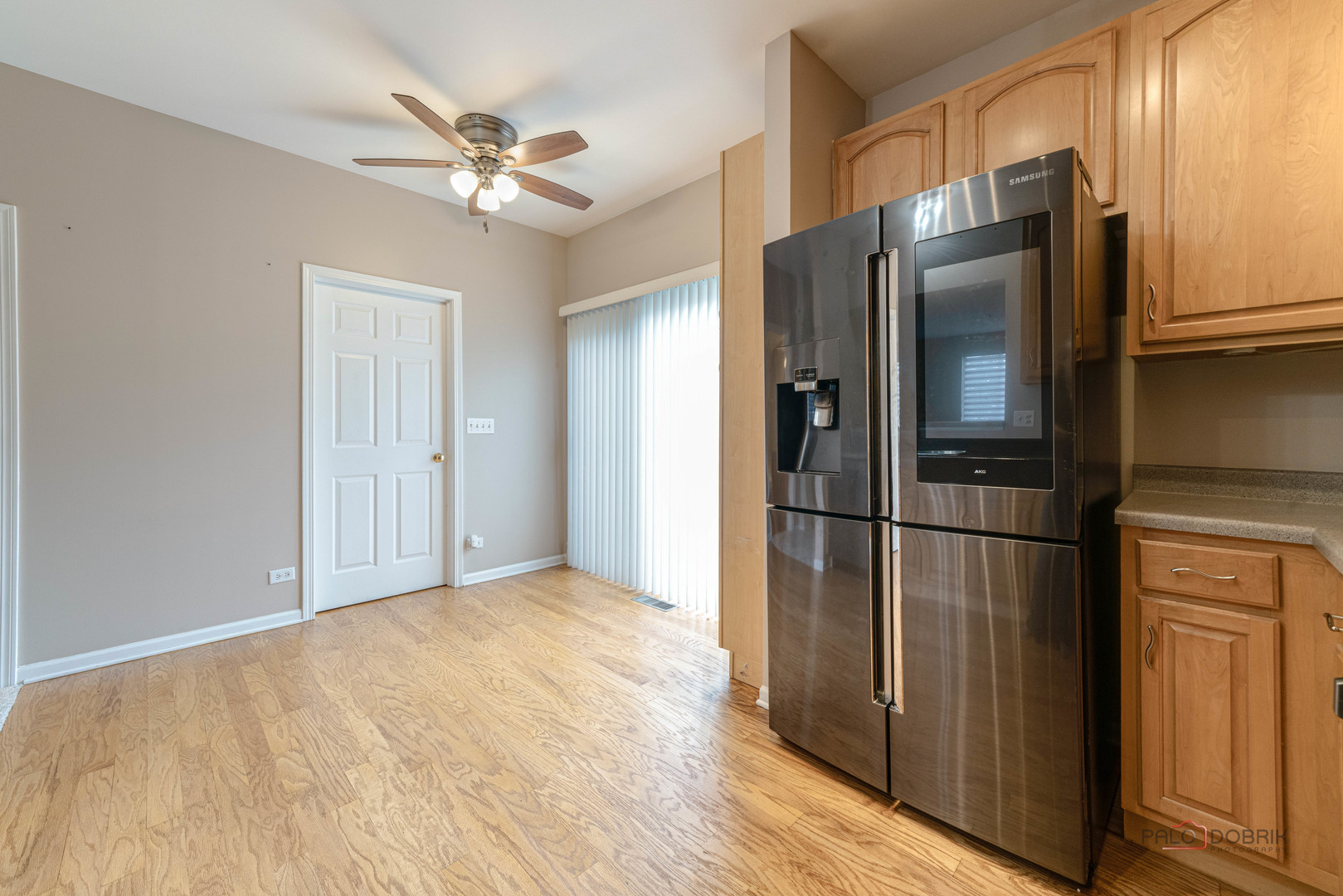1719 Sienna Court Wheeling, IL 60090 - Photo 18 of 34 a kitchen with stainless steel appliances a refrigerator and cabinets