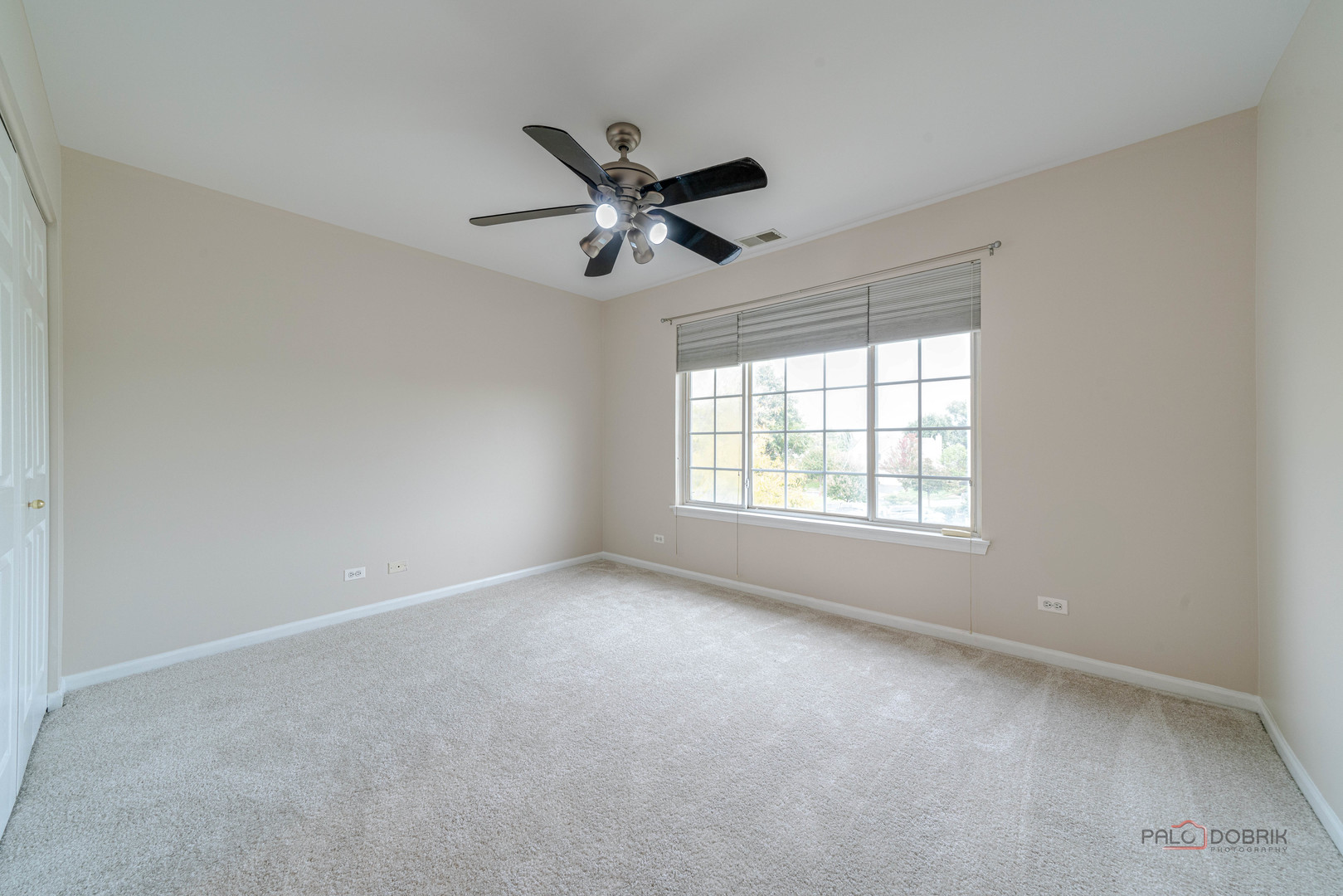 1719 Sienna Court Wheeling, IL 60090 - Photo 24 of 34 a view of an empty room with a window