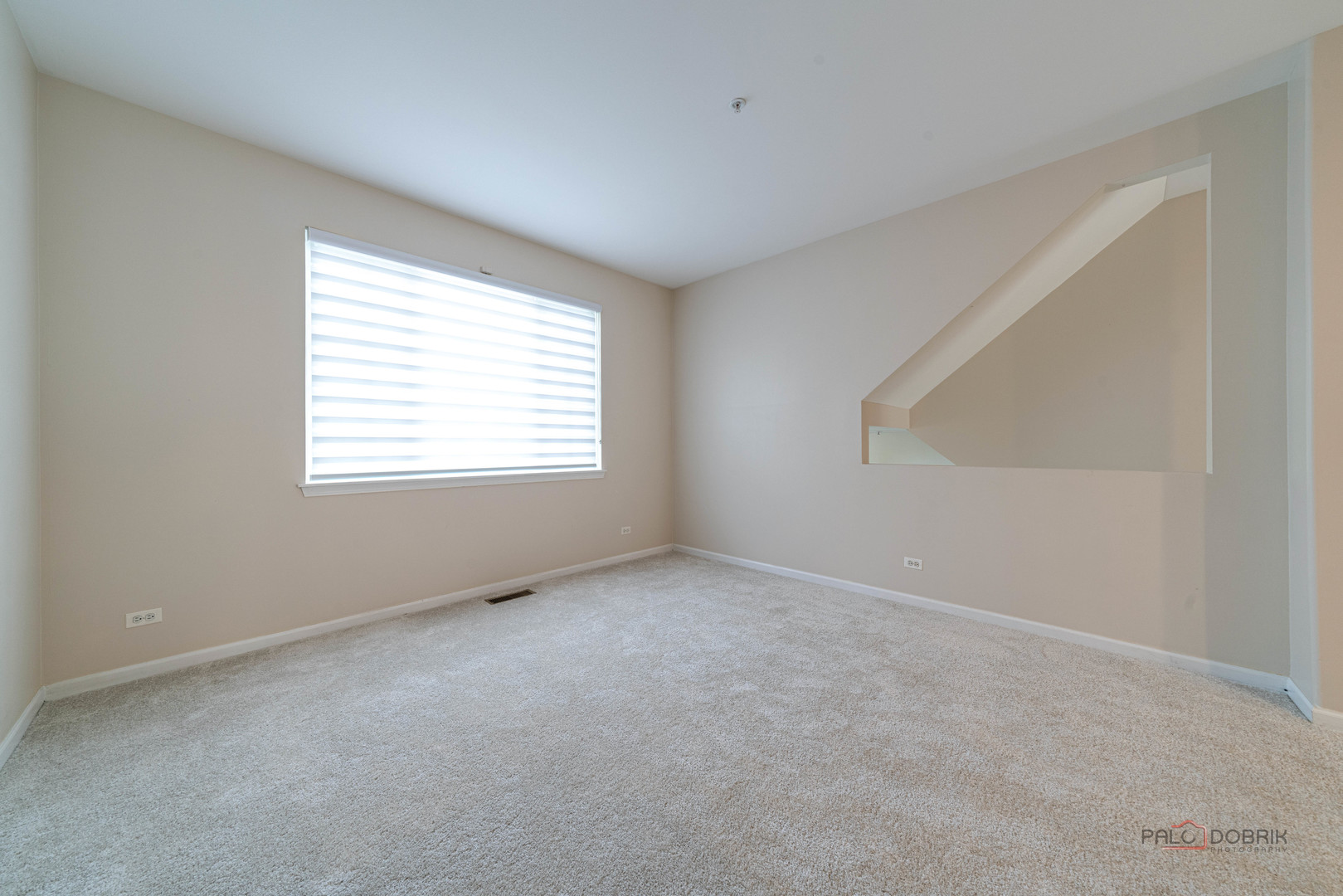1719 Sienna Court Wheeling, IL 60090 - Photo 26 of 34 an empty room with a window