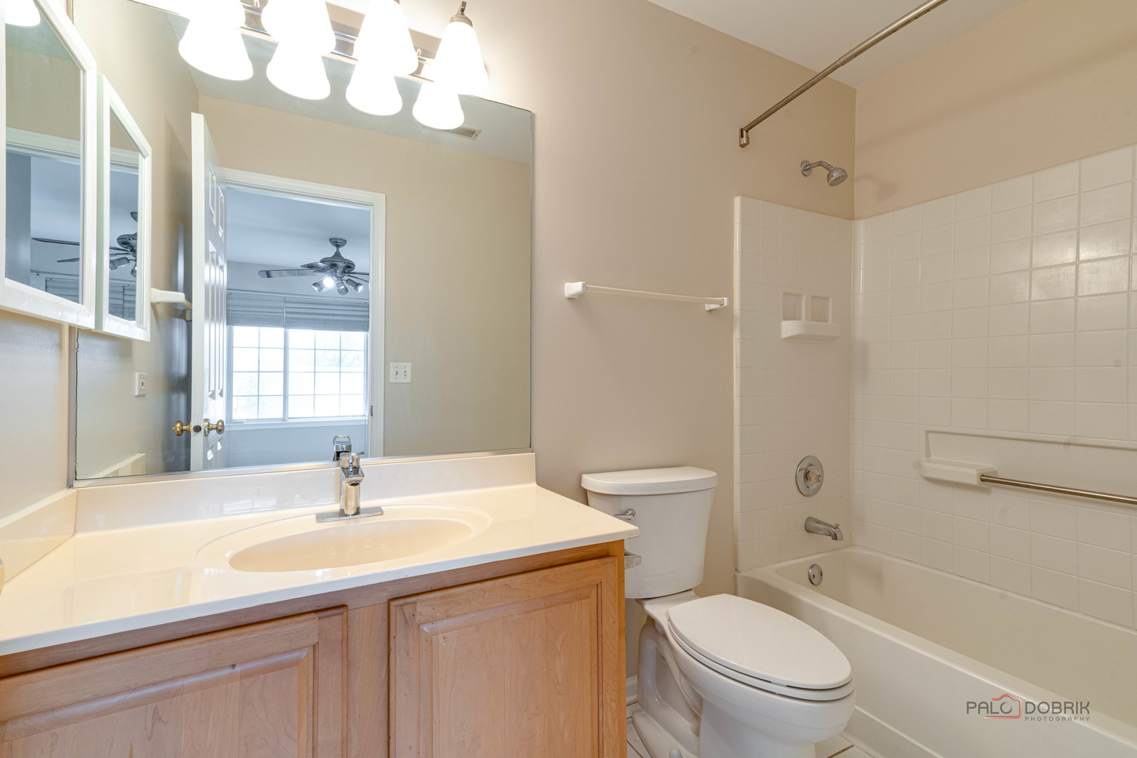 1719 Sienna Court Wheeling, IL 60090 - Photo 27 of 34 a bathroom with a sink a toilet and shower