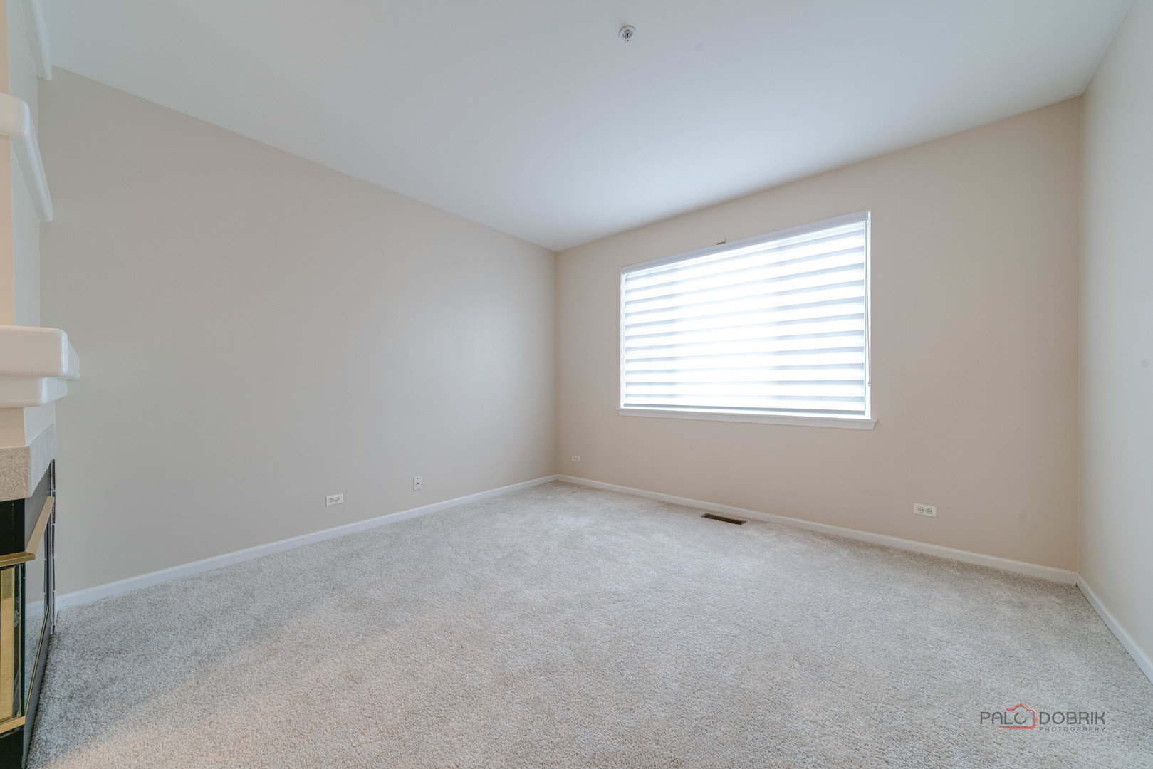 1719 Sienna Court Wheeling, IL 60090 - Photo 10 of 34 an empty room with a window