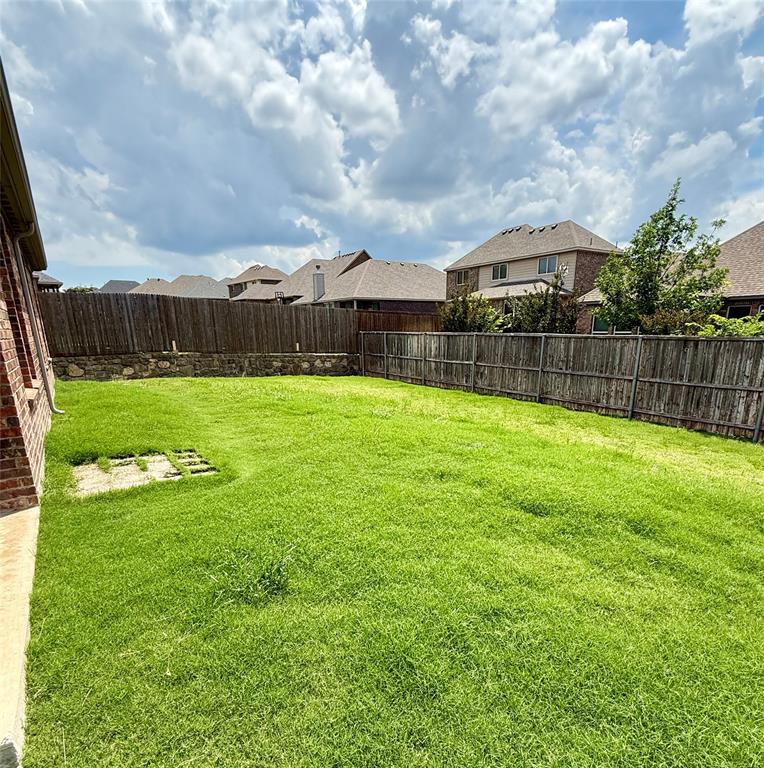 204 Flower Ridge Drive Fort Worth, TX 76108 - Photo 27 of 27 a view of a backyard