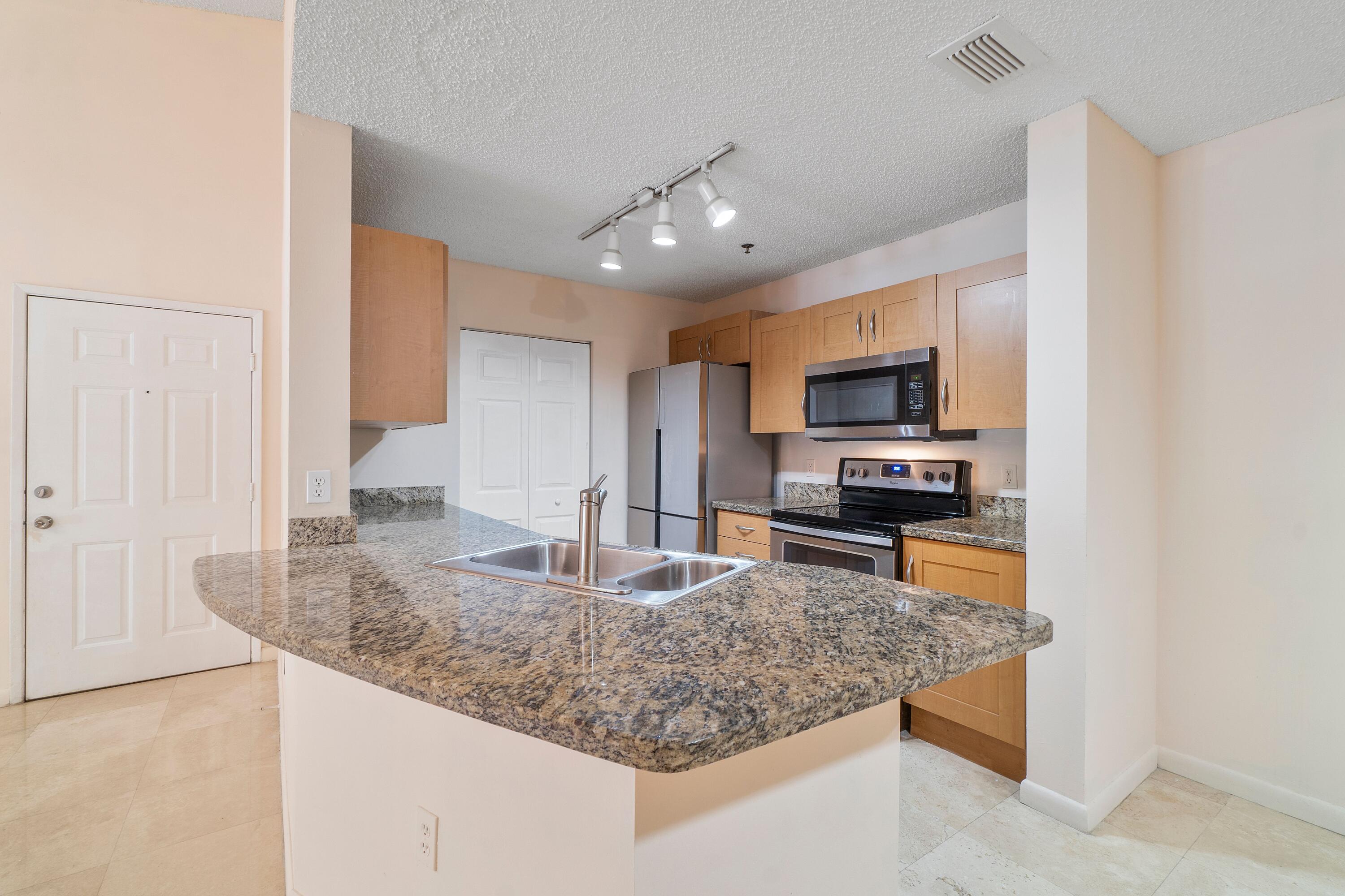 3207 Clint Moore Road, Unit 204 Boca Raton, FL 33496 - Photo 4 of 20 vA57z3Po
