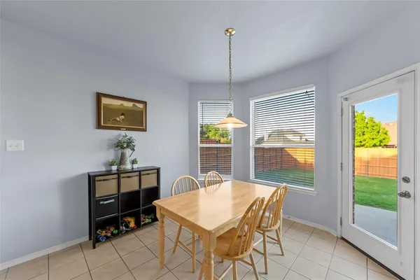 a view of a livingroom with furniture and window
