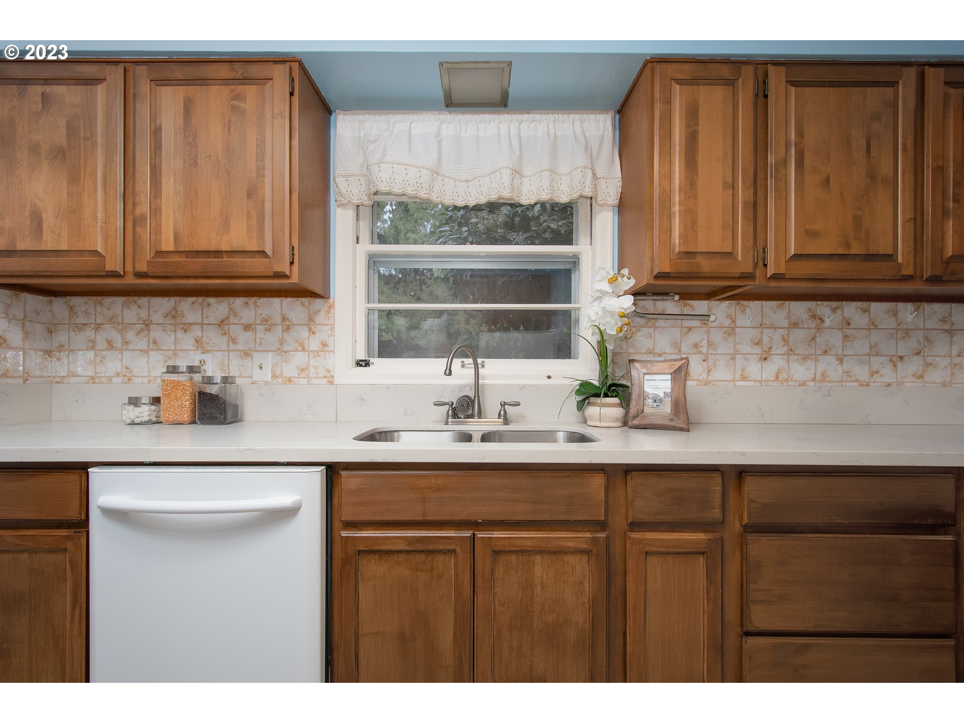 110 Northwest 12th Street Gresham, OR 97030 - Photo 16 of 43 a kitchen with stainless steel appliances granite countertop a sink and cabinets