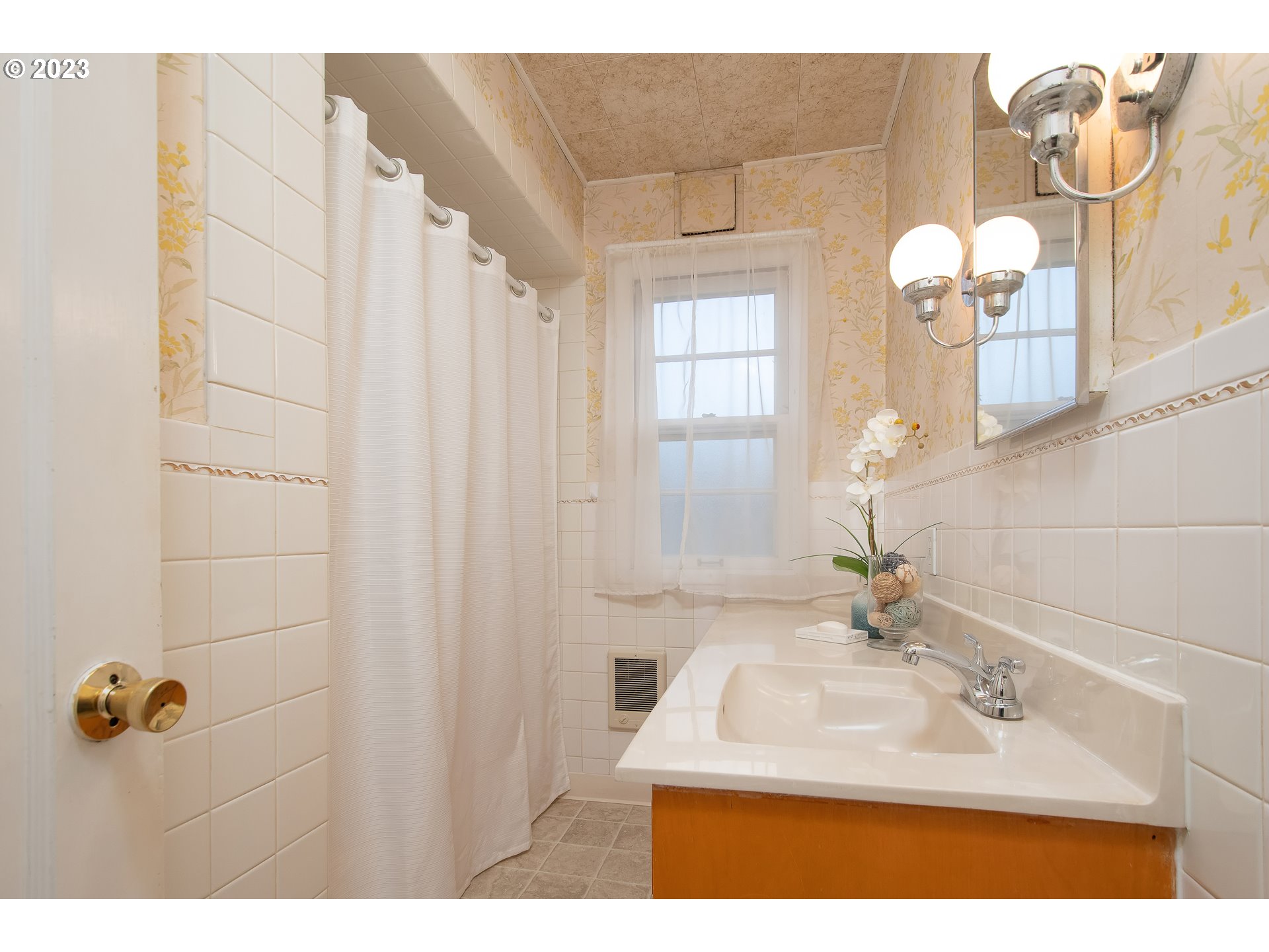 110 Northwest 12th Street Gresham, OR 97030 - Photo 30 of 43 a bathroom with a sink mirror and vanity
