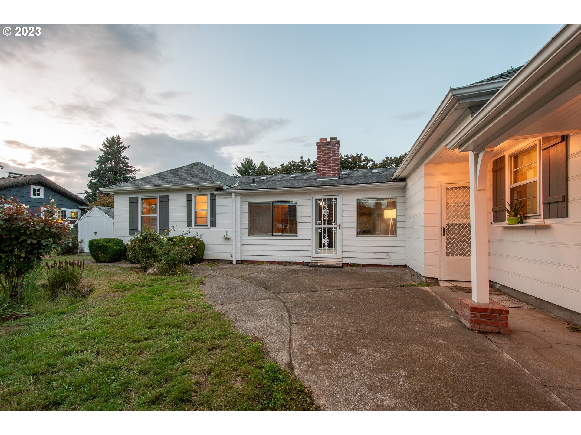 110 Northwest 12th Street Gresham, OR 97030 - Photo 34 of 43 a view of a yard in front of a house with a large windows