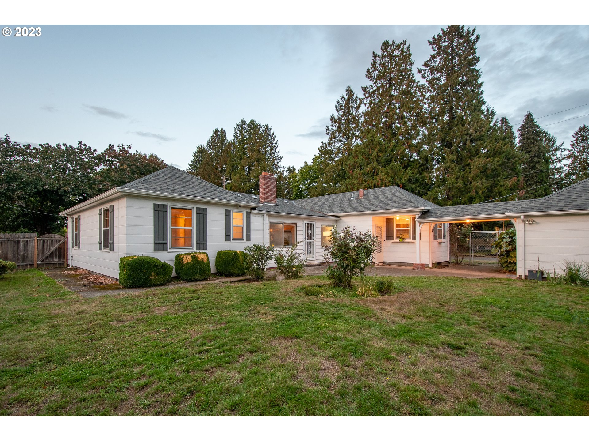 110 Northwest 12th Street Gresham, OR 97030 - Photo 37 of 43 a front view of a house with a yard and trees