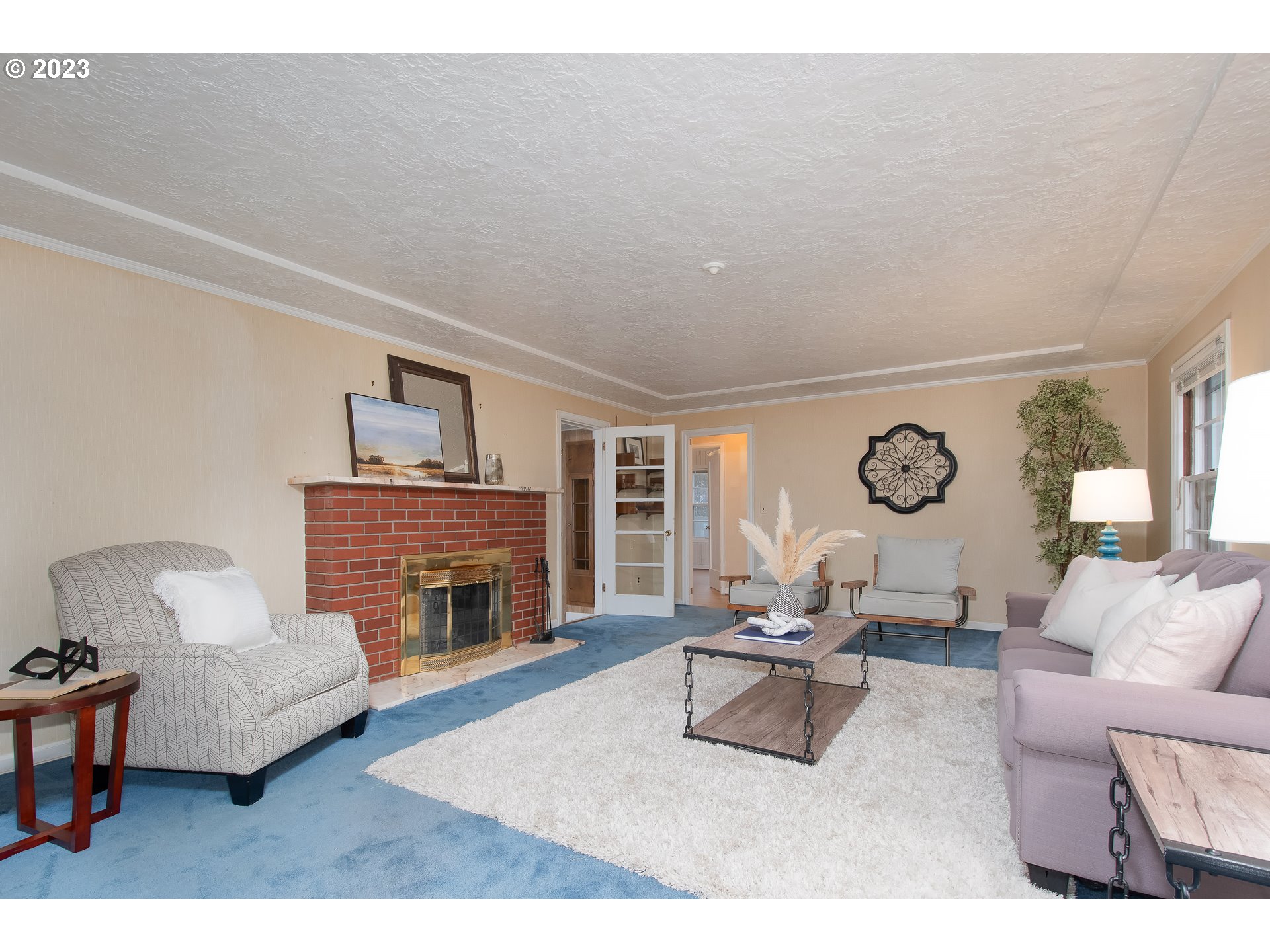 110 Northwest 12th Street Gresham, OR 97030 - Photo 5 of 43 a living room with furniture flat screen tv and a fireplace