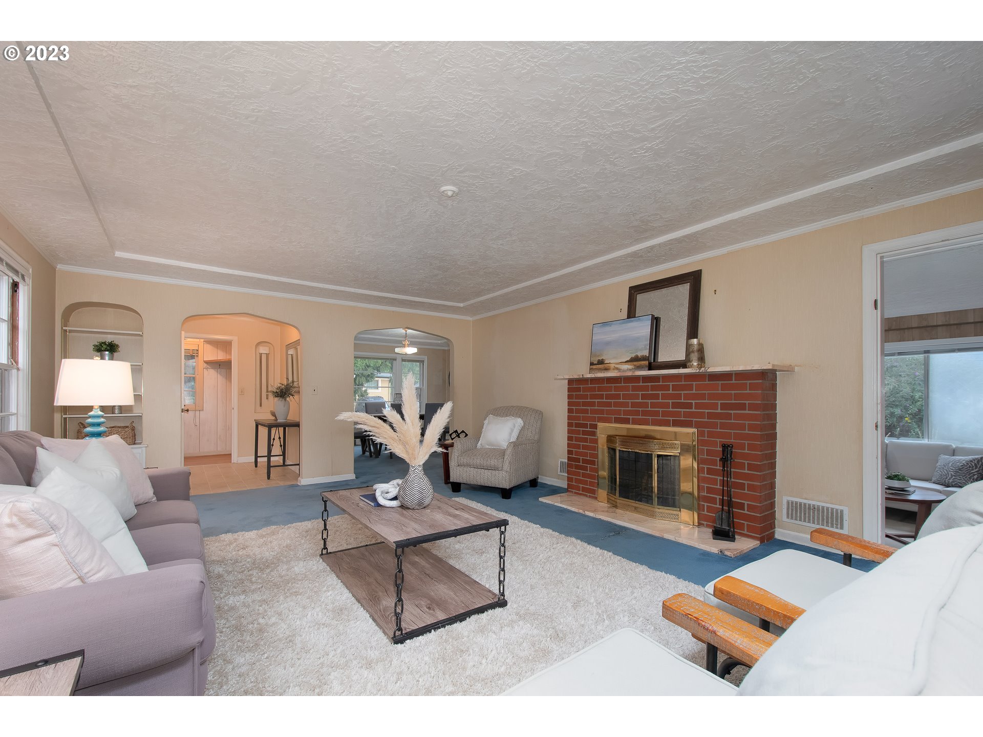 110 Northwest 12th Street Gresham, OR 97030 - Photo 9 of 43 a living room with furniture and a fireplace