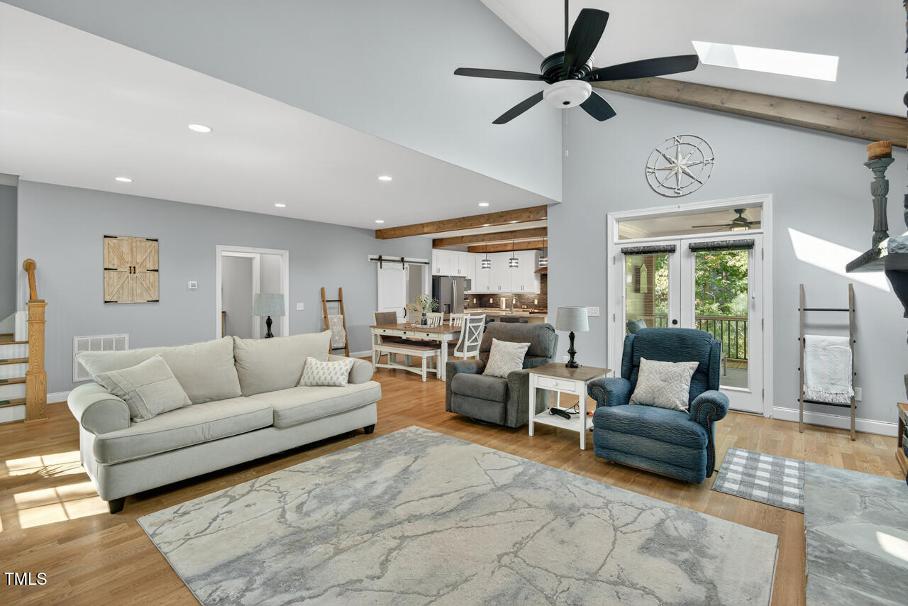 67 Ada Court Pittsboro, NC 27312 - Photo 16 of 63 a living room with furniture and a window