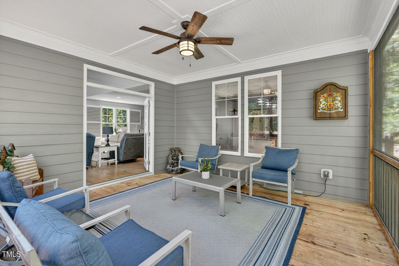 67 Ada Court Pittsboro, NC 27312 - Photo 29 of 63 a living room with furniture and a wooden floor