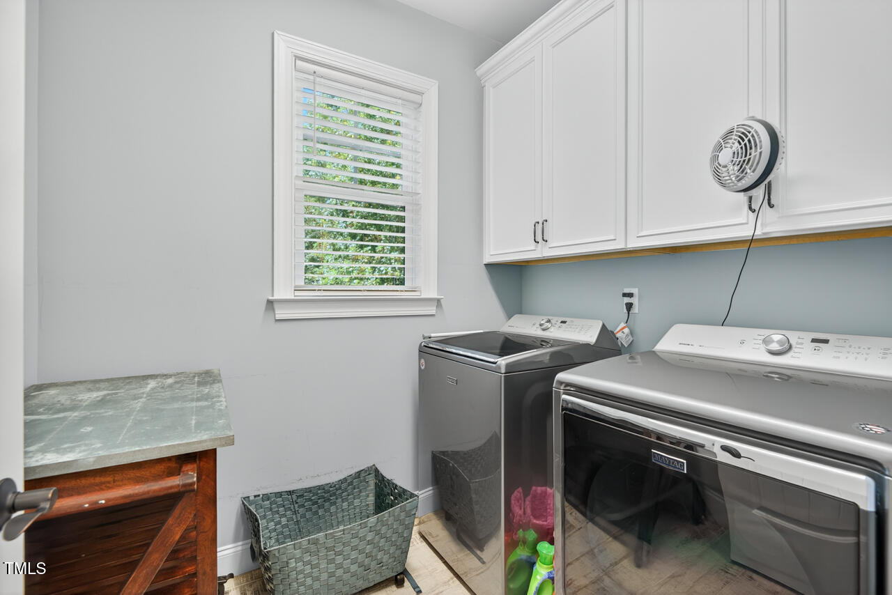 67 Ada Court Pittsboro, NC 27312 - Photo 38 of 63 a utility room with dryer and washer