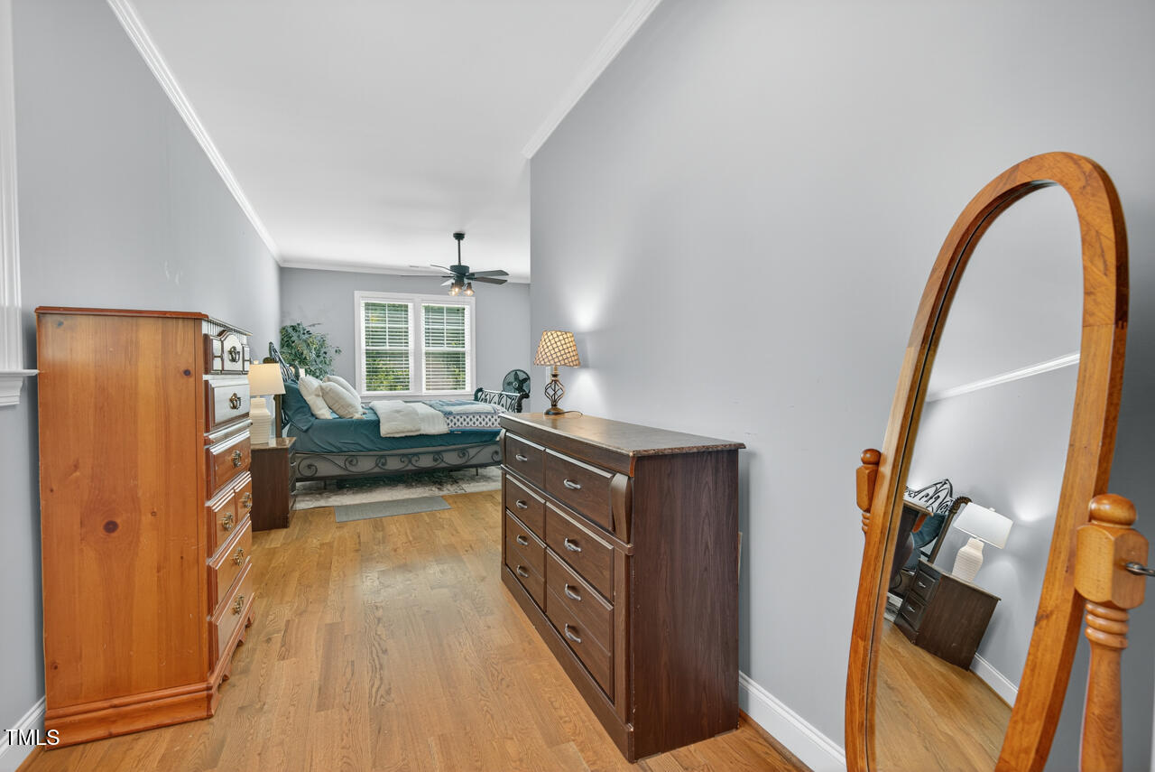 67 Ada Court Pittsboro, NC 27312 - Photo 39 of 63 a view of living room with furniture and a fireplace