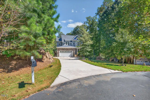 a sign board with yard in front of it