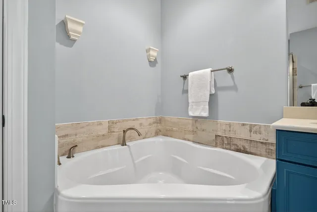 a bathroom with a double vanity sink mirror and double