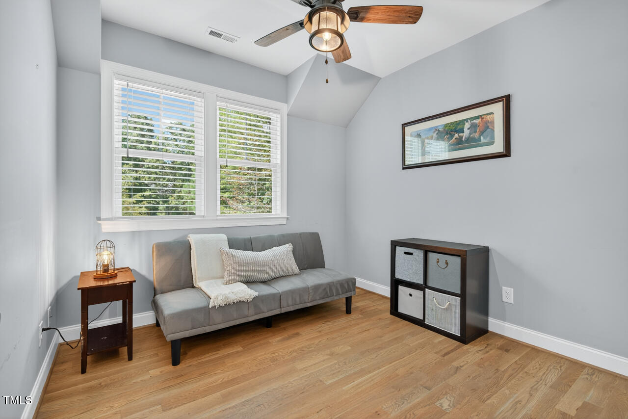 67 Ada Court Pittsboro, NC 27312 - Photo 45 of 63 a living room with furniture and a window