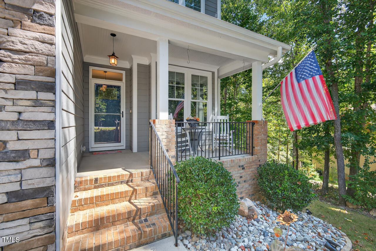 67 Ada Court Pittsboro, NC 27312 - Photo 6 of 63 a house view with a garden space