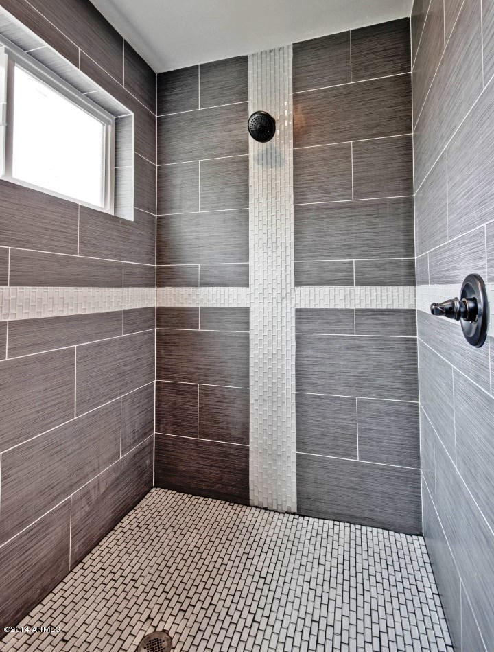 5227 East Osborn Road Phoenix, AZ 85018 - Photo 27 of 46 a bathroom with a shower