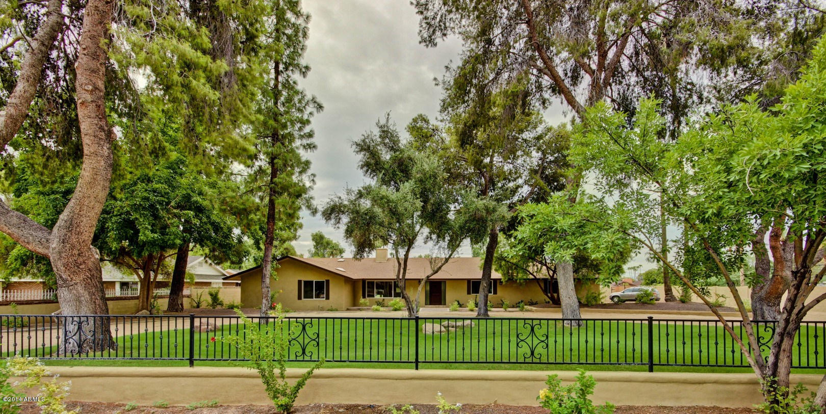 5227 East Osborn Road Phoenix, AZ 85018 - Photo 3 of 46 front view of a house with a street view