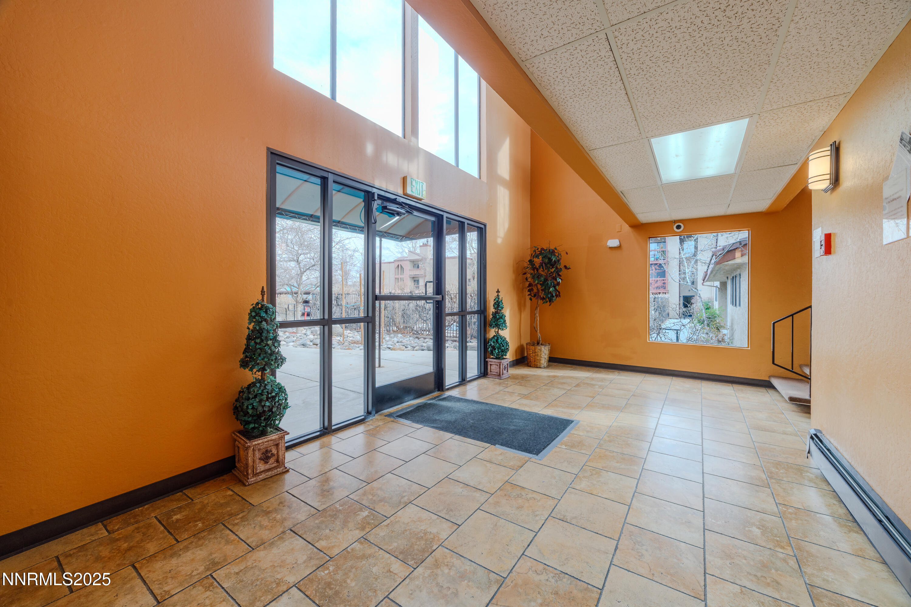 1000 Beck Drive, Unit 276 Reno, NV 89509 - Photo 2 of 10 a view of an entryway with a floor to ceiling window