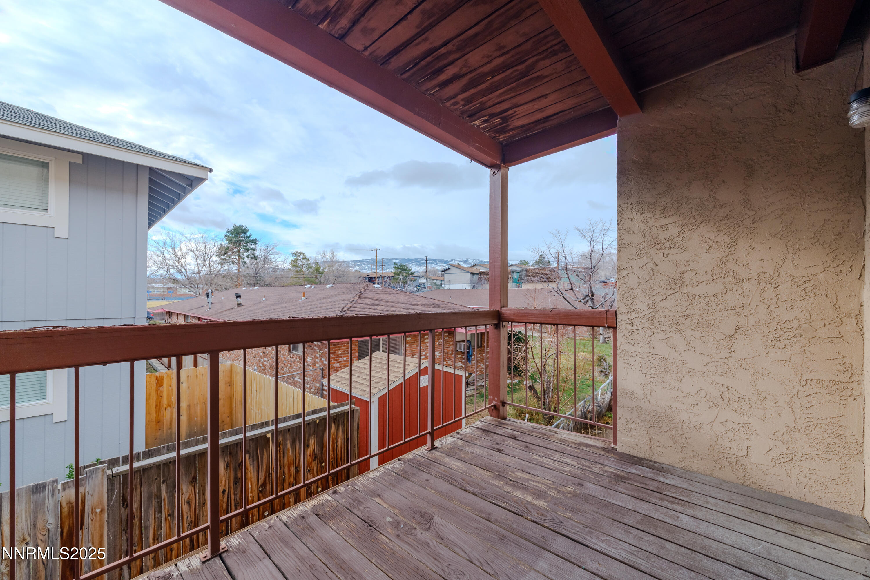 1000 Beck Drive, Unit 276 Reno, NV 89509 - Photo 9 of 10 a view of a balcony with wooden floor