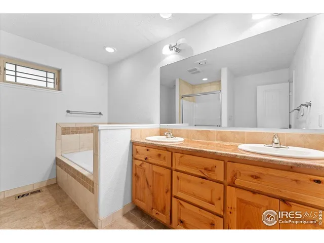 a bathroom with a sink a vanity and a mirror