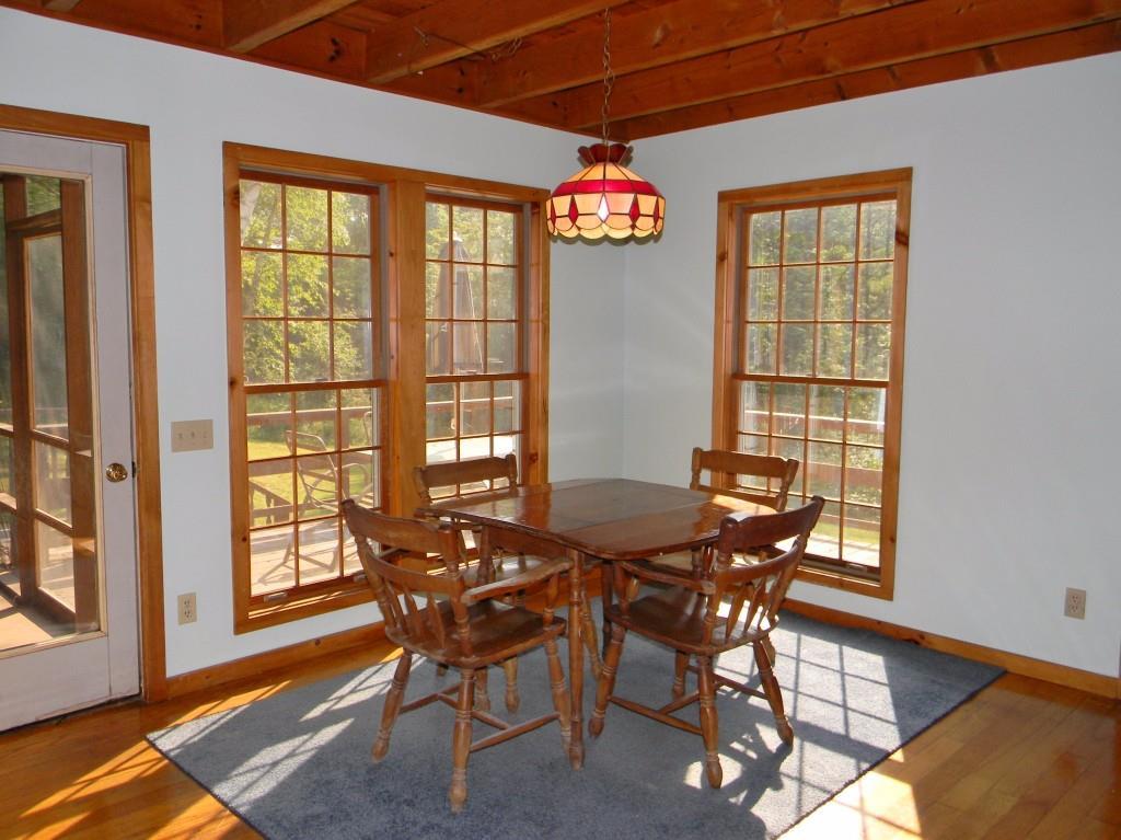 348 Fosters Point Road West Bath, ME 04530 - Photo 8 of 29 Dining room overlooks deck and yard.