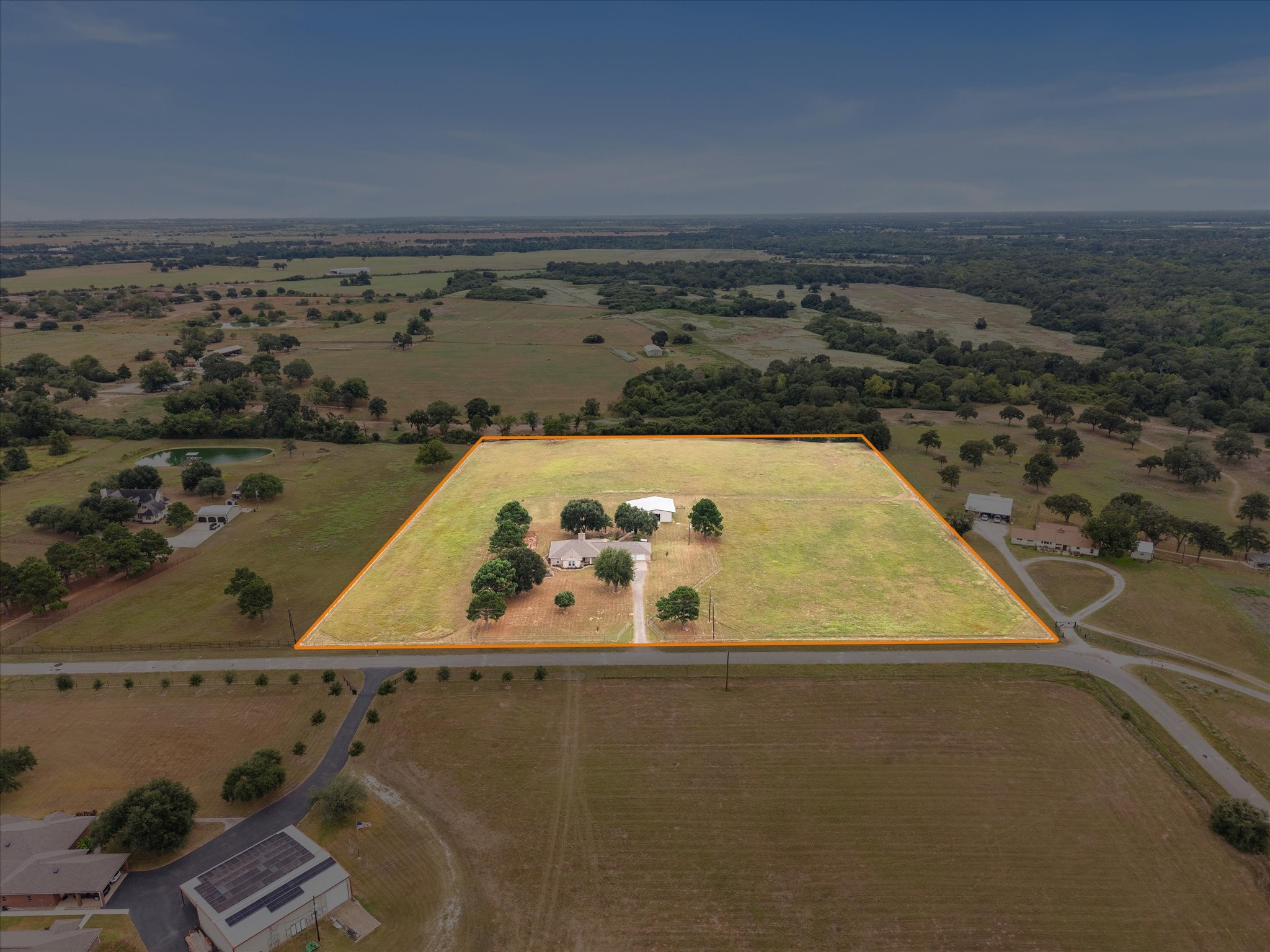 19929 Pierceall Road Hempstead, TX 77445 - Photo 2 of 50 Enjoy 10.5 acres of cleared, level land in the peaceful Pine Island community, offering space, privacy, and endless possibilities.