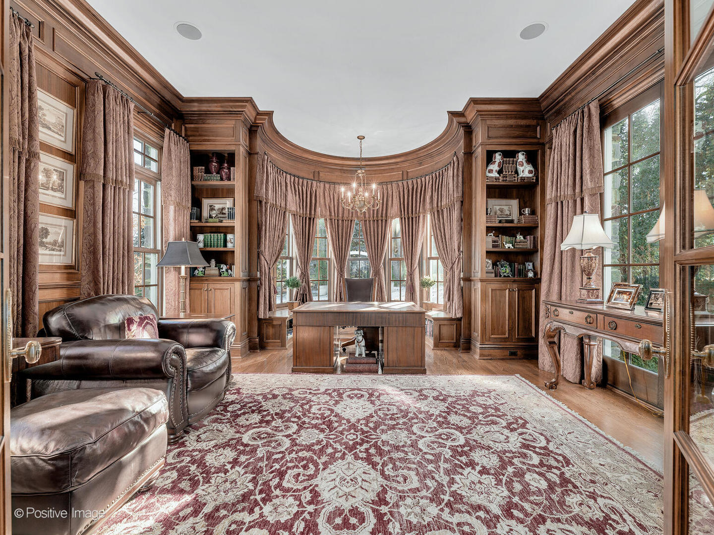 820 Taft Road Hinsdale, IL 60521 - Photo 10 of 46 a living room with furniture a fireplace and large windows