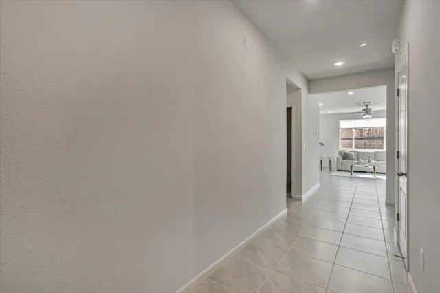 a bathroom with a granite countertop sink and vanity